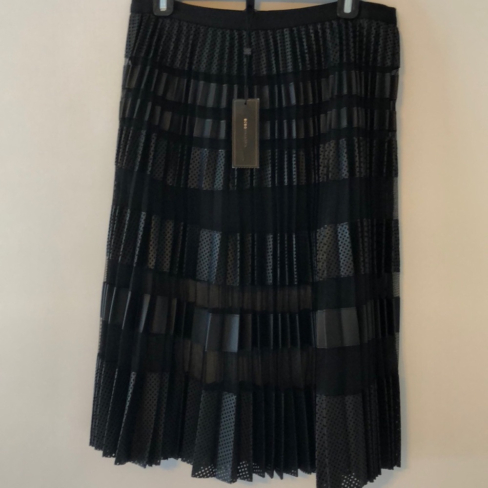 BCBG faux leather and sheer skirt